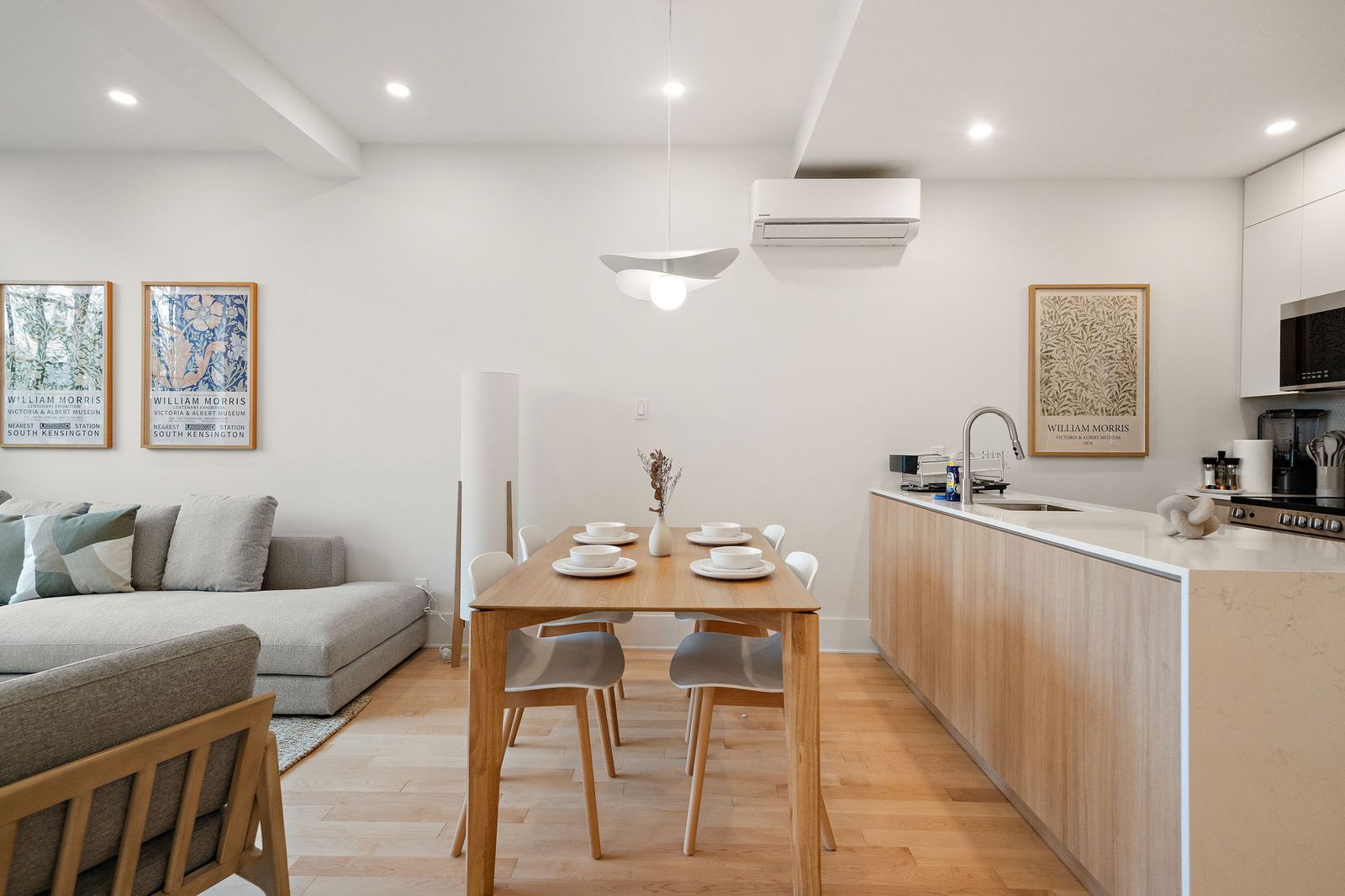 Open kitchen with dining table set for four